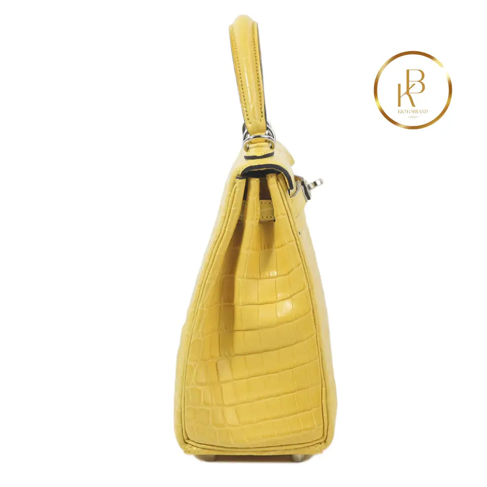 Kelly 25 Mimosa Matte Niloticus Croc Handbags