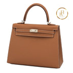 Kelly 25 Sellier Gold Epsom Handbags