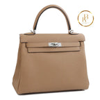 Kelly 25 Chai Togo Palladium Handbags