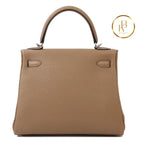 Kelly 25 Chai Togo Palladium Handbags