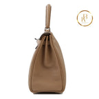 Kelly 25 Chai Togo Palladium Handbags