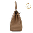 Kelly 25 Chai Togo Palladium Handbags
